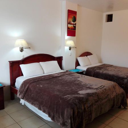 Hotel Pacifico ปูแอร์โตโลเปซ ภายนอก รูปภาพ