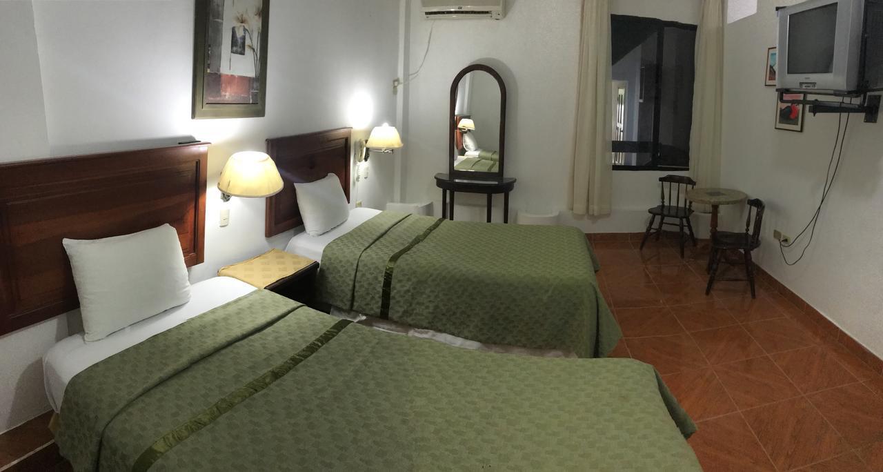 Hotel Pacifico ปูแอร์โตโลเปซ ภายนอก รูปภาพ