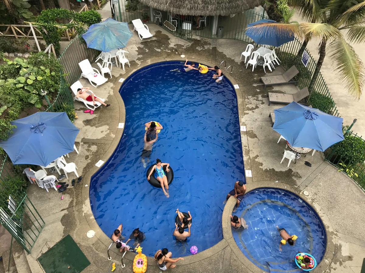 Hotel Pacifico ปูแอร์โตโลเปซ ห้อง รูปภาพ