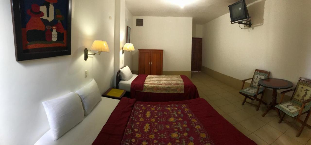 Hotel Pacifico ปูแอร์โตโลเปซ ห้อง รูปภาพ